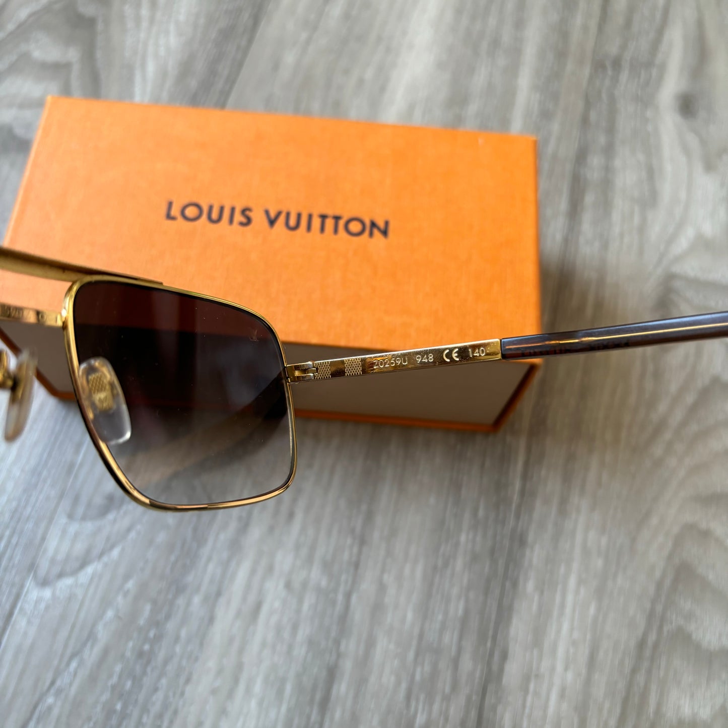 Louis Vuitton Attitude Sunglasses Gold